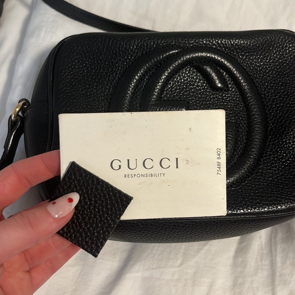 Black Gucci camera bag crossbody